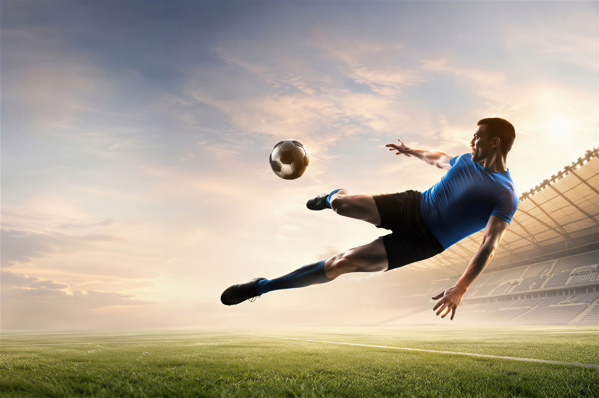 Fototapeten Fußballspieler in der Luft im Stadion dynamisch für das Jugendzimmer